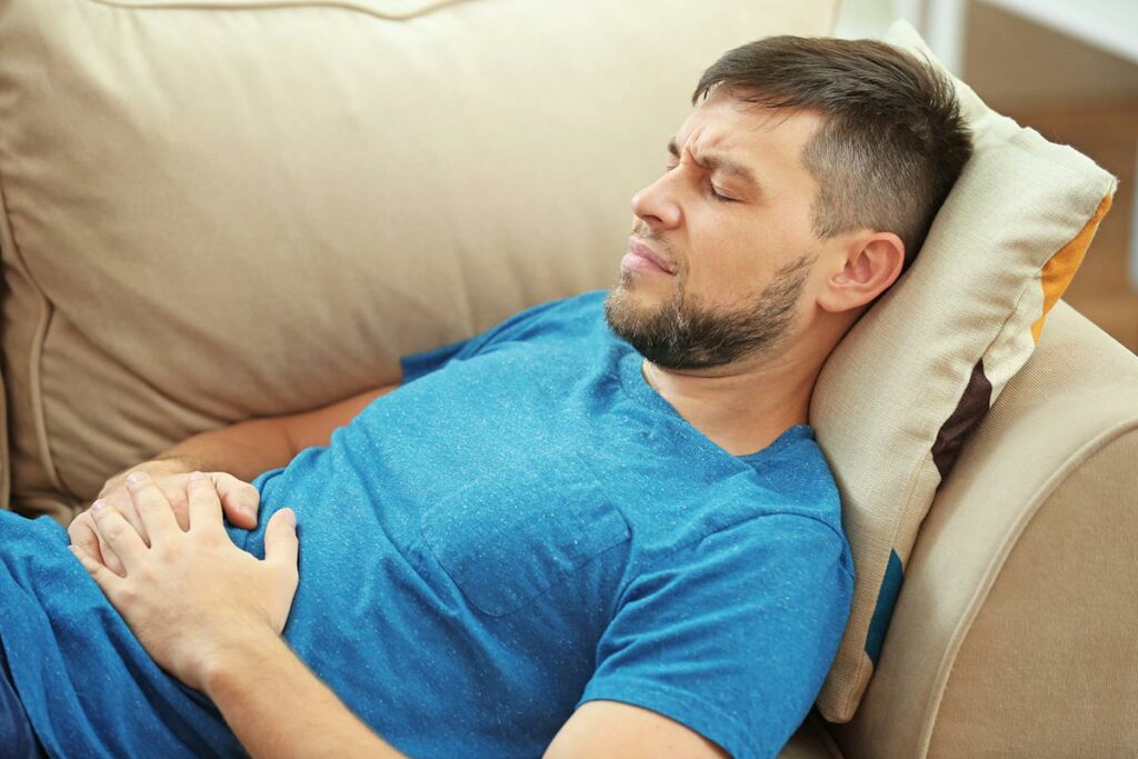 Guy suffering from flatulence