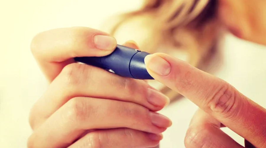Woman Checking the Glucose Level