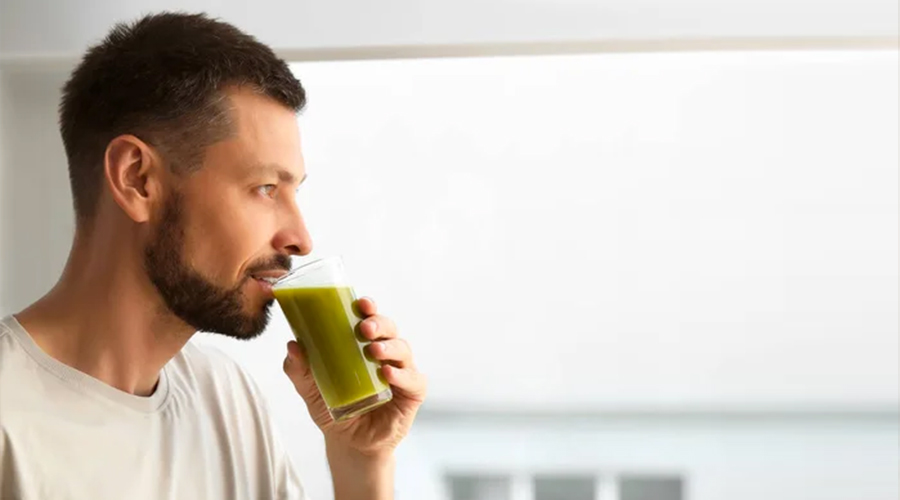 Man drinking delicious juice