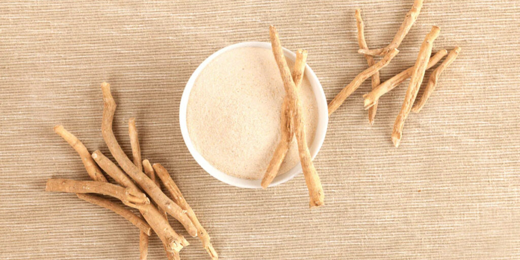 ashwagandha root and powder in white bowl