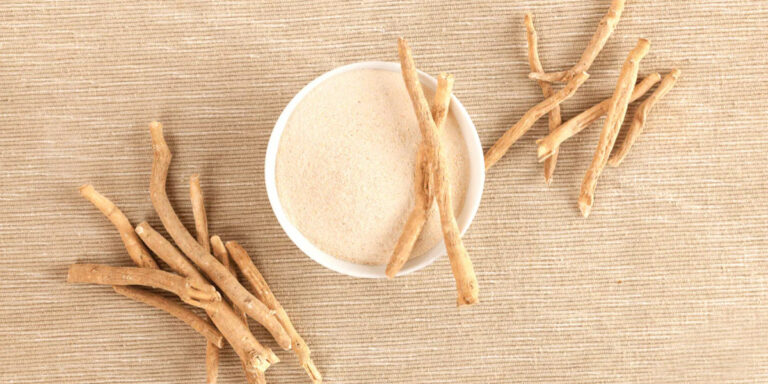 ashwagandha root and powder in white bowl