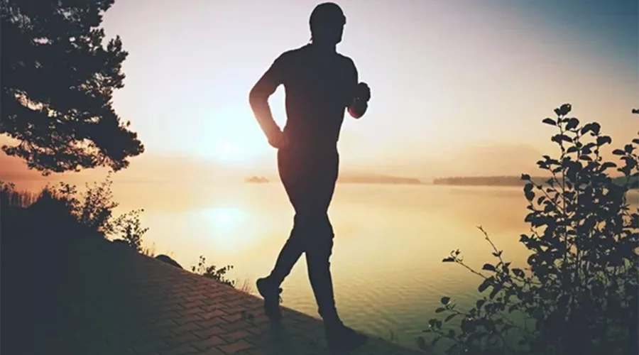Man runs on pavement