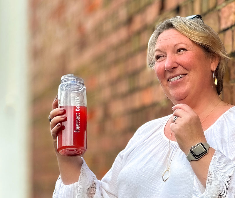 Drinking Red tonik in shaker bottle